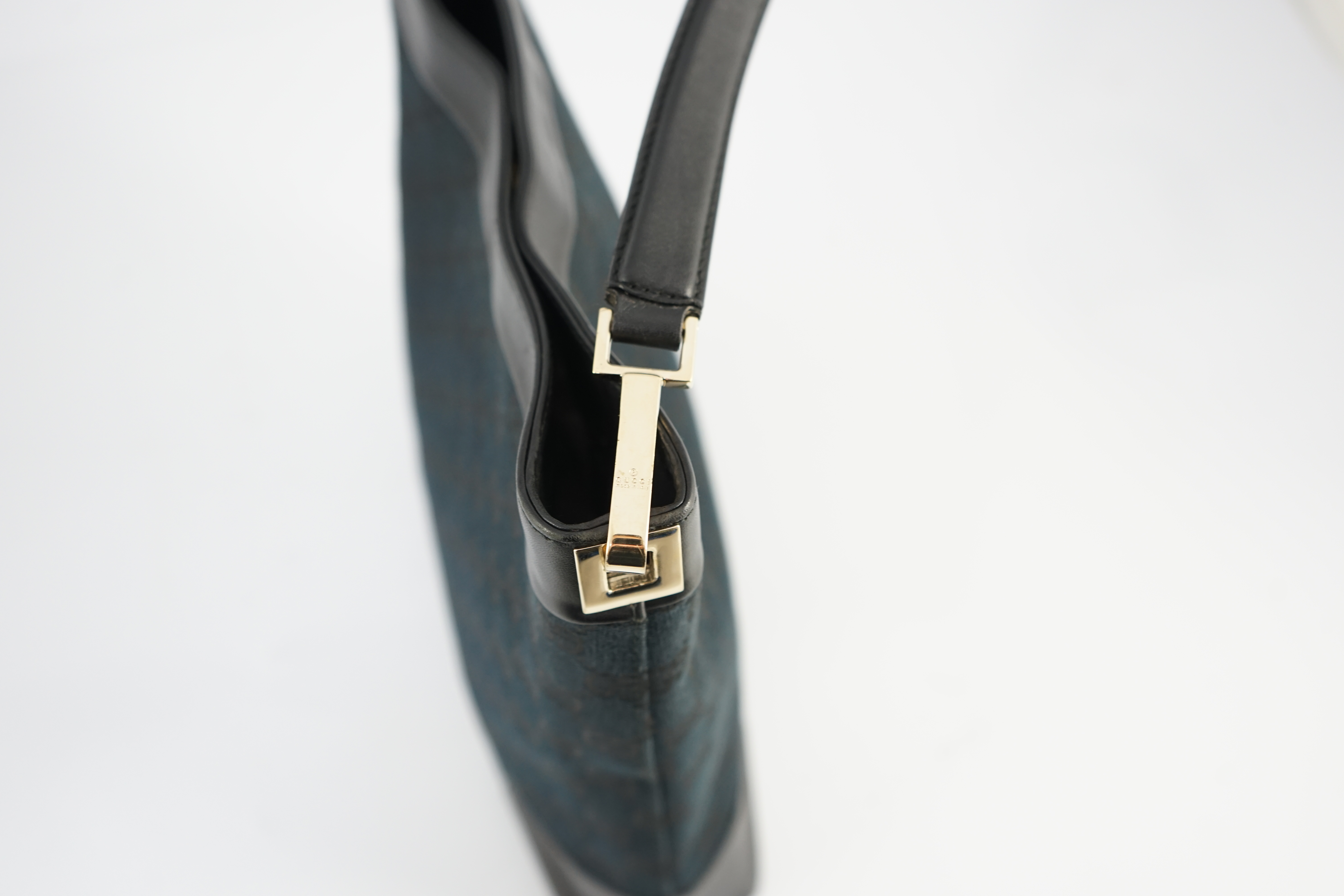 A Gucci black GG canvas shoulder bag width 26cm, depth 6cm, approx height 25cm